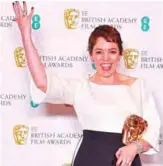  ??  ?? British actress Olivia Colman poses with the award for a Leading Actress for her work on the film ‘The Favorite’.