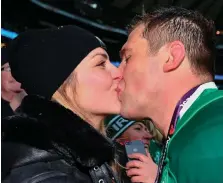  ??  ?? CJ Stander kisses wife Jean-Marie in the stands at Twickenham after winning the Grand Slam. Inset below: Young stars of the famous victory Jordan Larmour and Garry Ringrose