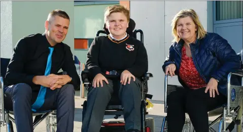  ??  ?? Luca Pezzillo (centre) with Deputy Principal Martin Locke and Mary Doyle, who took part in a ‘Week in a Seat’ at Pres Bray.