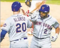  ??  ?? Dom Smith (r.) and Pete Alonso provide serious pop in Mets lineup.