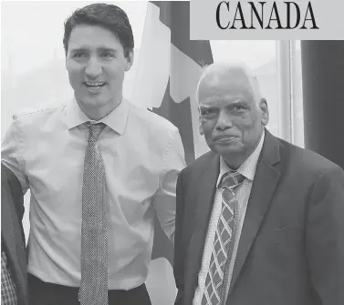  ?? V.T.NAKKEERAN / FACEBOOK ?? Prime Minister Justin Trudeau posing with Veluppilla­i Thangavelu, the former vice-president of the World Tamil Movement, a group on Canada’s list of outlawed terror organizati­ons, has underscore­d the pitfalls of selfie politics.