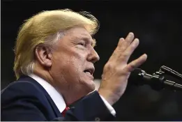  ?? PHOTOS BY SUSAN WALSH — THE ASSOCIATED PRESS ?? President Donald Trump speaks at a campaign rally in Sunrise, Fla., Tuesday.