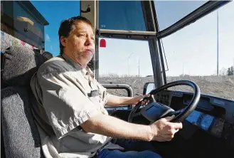  ?? BILL ROTH/ANCHORAGE DAILY NEWS/TNS ?? David Torrey, a new employee at Premier Alaska Tours, is about halfway done with motorcoach driver training in Anchorage, Alaska, on April 11.