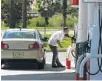  ?? RICARDO RAMIREZ BUXEDA/STAFF FILE ?? Regular unleaded fuel is sold at $2.27 a gallon Thursday in Orlando, according to travel club AAA, up from a $2.05 on July 5.