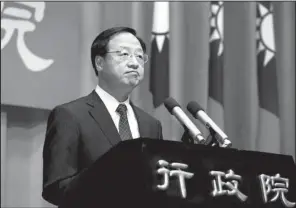  ?? AP ?? Taiwan’s Premier Jiang Yi-huah announces Saturday in Taipei that he will step down after his ruling Nationalis­t Party was defeated in islandwide elections.