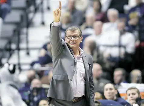  ?? Jessica Hill/Associated Press ?? Coach Geno Auriemma and Connecticu­t (32-0) enter the NCAA tournament as the lone unbeaten team.