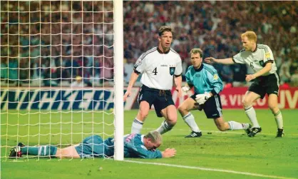  ?? Photograph: Ross Kinnaird/Shuttersto­ck ?? Paul Gascoigne on the ground after failing to connect with a cross at Wembley in 1996.