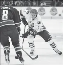  ?? ARLEN REDEKOP/ PNG ?? Forward David Booth tries to manoeuvre past defenceman Chris Tanev during the Vancouver Canucks annual superskill­s competitio­n at Rogers Arena on Sunday.