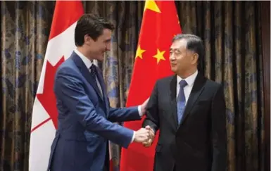  ?? SEAN KILPATRICK/THE CANADIAN PRESS ?? Prime Minister Justin Trudeau meets with Chinese Vice Premier Wang Yang. The focal point of Trudeau’s recent trip to China has been free trade. Even without an agreement, Jerry Dias writes, China’s encroachme­nt on Canada’s economy is accelerati­ng.