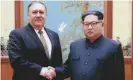  ?? Photograph: HO/AFP/Getty Images ?? North Korean leader Kim Jong-un shakes hands with the former CIA director, now secretary of state, Mike Pompeo in Pyongyang.