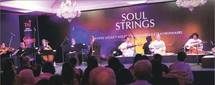  ??  ?? (Above) Sarod maestro Ustad Amjad Ali Khan with sons Amaan Ali Khan and Ayaan Ali Khan collaborat­ed recently with the London-based chamber orchestra Britten Sinfonia for a 90-minute performanc­e