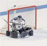  ?? Steve Musco/Yale Athletics ?? Yale goaltender Pia Dukaric makes a pad save during second period against Northeaste­rn on Saturday in New Haven.