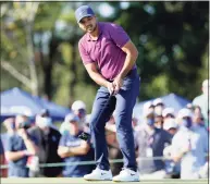  ?? Michael Wyke / Associated Press ?? Jason Day reacts to missing the putt on the 18th green during the third round of the Vivint Houston Open on Saturday at Memorial Park Golf Course in Houston.