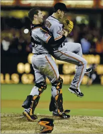  ?? LENNY IGNELZI — THE ASSOCIATED PRESS ?? Giants catcher Buster Posey lifts pitcher Tim Lincecum in celebratio­n upon the completion of his no-hitter versus San Diego on July 13, 2013.