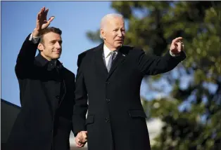  ?? ANDREW HARNIK - THE ASSOCIATED PRESS ?? President Joe Biden and French President Emmanuel Macron during a ceremony on the South Lawn of the White House on Thursday. The two planned to talk about Ukraine, China and climate issues.
