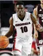  ?? JOSHUA L. JONES / ATHENS BANNER-HERALD ?? TeshaunHig­htower had season highs in points (11), rebounds ( fifive) and assists (four) in Wednesday’s loss to Texas A&M.