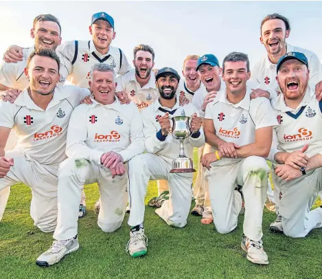  ?? Picture: Donald MacLeod. ?? Forfarshir­e captain Umair Mohammed and his side celebrate victory in the Grand Final.