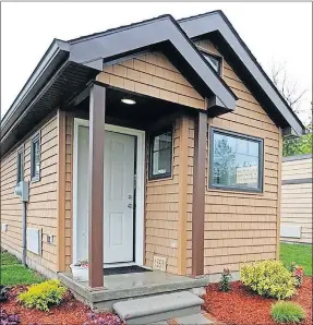  ??  ?? An example of the kinds of tiny houses Pivot Inc. is building just off NE 50 at Walnut Avenue.