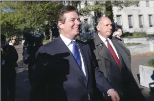  ?? Associated Press photo ?? Paul Manafort leaves Federal District Court in Washington, Monday. Manafort, President Donald Trump’s former campaign chairman, and Manafort’s business associate Rick Gates have pleaded not guilty to felony charges of conspiracy against the United...