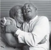  ?? CHARLES TRAINOR JR. Miami Herald file, 2001 ?? Mary Jones hugs her brother, Jerry Townsend, in his attorney’s office in Fort Lauderdale on June 27, 2001. Townsend was released from prison after DNA cleared him of several crimes.