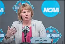  ?? AP FILE PHOTO ?? Lynn Holzman, NCAA vice president for women’s basketball, speaks during a news conference last year in Minneapoli­s. The NCAA changed the format of the women’s tournament this year, featuring two regional sites instead of the traditiona­l four. The games in Greenville, South Carolina and Seattle are the latest step to grow the sport and show the women’s game can stand on its own.