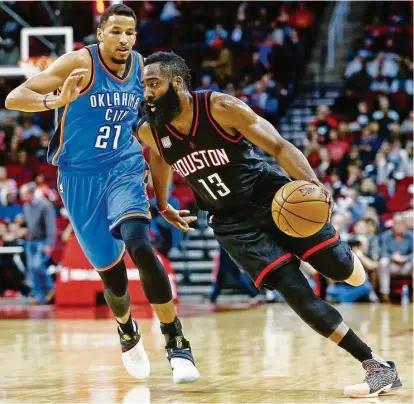  ?? Jon Shapley / Houston Chronicle ?? Thunder forward Andre Roberson, left, will be charged with limiting Rockets guard James Harden as much as he can in their first-round NBA playoff series, which begins tonight at Toyota Center.
