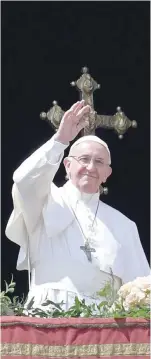  ?? — AFP ?? Pope Francis greets the crowd during the Easter Sunday mass at St Peter’s square in Vatican.