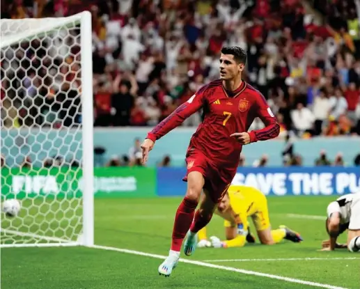  ?? AP ?? EL GRITO DEL GOLEADOR Morata celebra el gol con el que España abrió el marcador ante Alemania. Ya suma dos goles en Qataer 2022.