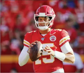  ?? COLIN E. BRALEY — THE ASSOCIATED PRESS ?? Kansas City Chiefs quarterbac­k Patrick Mahomes (15) warms up before an NFL preseason football game against the Cincinnati Bengals in Kansas City, Mo., Saturday.