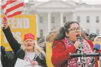  ?? PABLO MARTINEZ MONSIVAIS/THE ASSOCIATED PRESS ?? Celina Benitez, who was born in El Salvador and migrated with her family to the United States, speaks during a rally Monday across from the White House in Washington in reaction to the announceme­nt regarding Temporary Protective Status for people from...