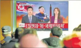  ?? REUTERS FILE ?? n People in Seoul watch a news report on North Korea firing an ICBM in November.