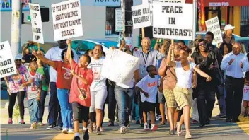  ?? U-T FILE PHOTO ?? Residents and local leaders of the neighborho­ods rallied against violence at Euclid and Imperial avenues in 2011.