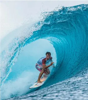  ?? JEROME BROUILLET/GETTY-AFP ?? Kauli Vaast, of Tahiti, is among the athletes qualified for the Olympic surfing competitio­n, which will be held in French Polynesia in July. It’s nearly 10,000 miles away from Paris, the host city.