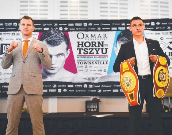  ?? Picture: ALIX SWEENEY ?? Jeff Horn (left) cut an imposing figure when he faced off with rival Tim Tszyu in Townsville on Monday.