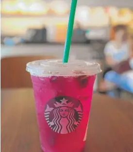  ?? JOE RAEDLE/GETTY IMAGES ?? Starbucks has announced it is phasing out all plastic straws, and American Airlines said it will do the same.