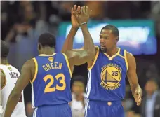  ?? KEN BLAZE, USA TODAY SPORTS ?? Kevin Durant, right, is on the cusp of a title in his first season with Draymond Green and the rest of the Warriors.