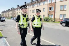  ??  ?? On patrol Chief Inspector Martin Gallager (right)