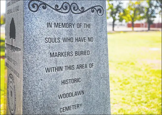  ?? Las Vegas Review-journal @rookie__rae ?? Rachel Aston
An obelisk donated by the African American Genealogy Society memorializ­es unidentifi­ed bodies at Woodlawn Cemetery.