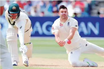  ?? — Reuters ?? Australia’s Mitchell Starc reaches to make his ground as England’s James Anderson drops a catch.