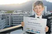  ?? PICTURE: Halden Krog ?? PRETEEN TALENT: William Colglazier, 9, with the award he won for his tourism app