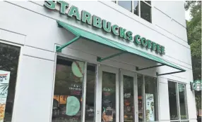  ??  ?? Corporate-owned Starbucks locations will be closed Tuesday afternoon as employees receive racial-bias training in response to a Philadelph­ia incident. BYRON DOBSON/DEMOCRAT