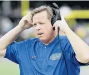  ?? AP FILE ?? Jim McElwain’s Gators gave up the team hotel in Gainesvill­e for Friday night.