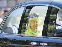  ??  ?? Prince Harry walks with his best man, the Duke of Cambridge, and the Queen arrives, at St George’s Chapel, Windsor Castle, before the wedding