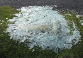  ??  ?? Shocking: The mound of shattered glass shards simply dumped at the upper viewing park on the Short Mountain south of Tralee last week.