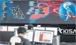  ?? YONHAP/GETTY-AFP ?? South Korean cyber experts monitor the WannaCry global attack Monday from Seoul.