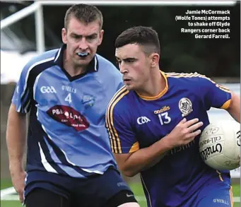  ??  ?? Jamie McCormack (Wolfe Tones) attempts to shake off Glyde Rangers corner back Gerard Farrell.