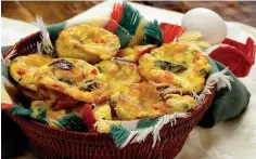  ?? Associated Press ?? Mushroom and asparagus muffin frittatas are quick and easy to prepare and can be filled with any of your favorite cheese, vegetable and/or meat combos.