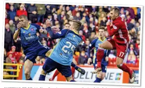  ??  ?? CUTTING EDGE: McGinn fires home to cap a display full of vigour and creativity