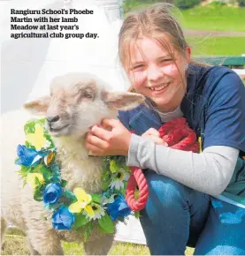  ?? ?? Rangiuru School’s Phoebe Martin with her lamb Meadow at last year’s agricultur­al club group day.