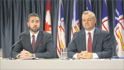  ?? JAMES MCLEOD/THE TELEGRAM ?? Justice Minister Andrew Parsons and deputy minister Todd Stanley speak to the media Monday at Confederat­ion Building, as the government begins an emergency session of the House of Assembly to pass amendments to the Newfoundla­nd and Labrador Elections...